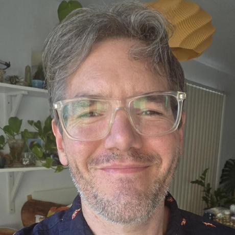 Wesley Schaeppi smiling in a home office